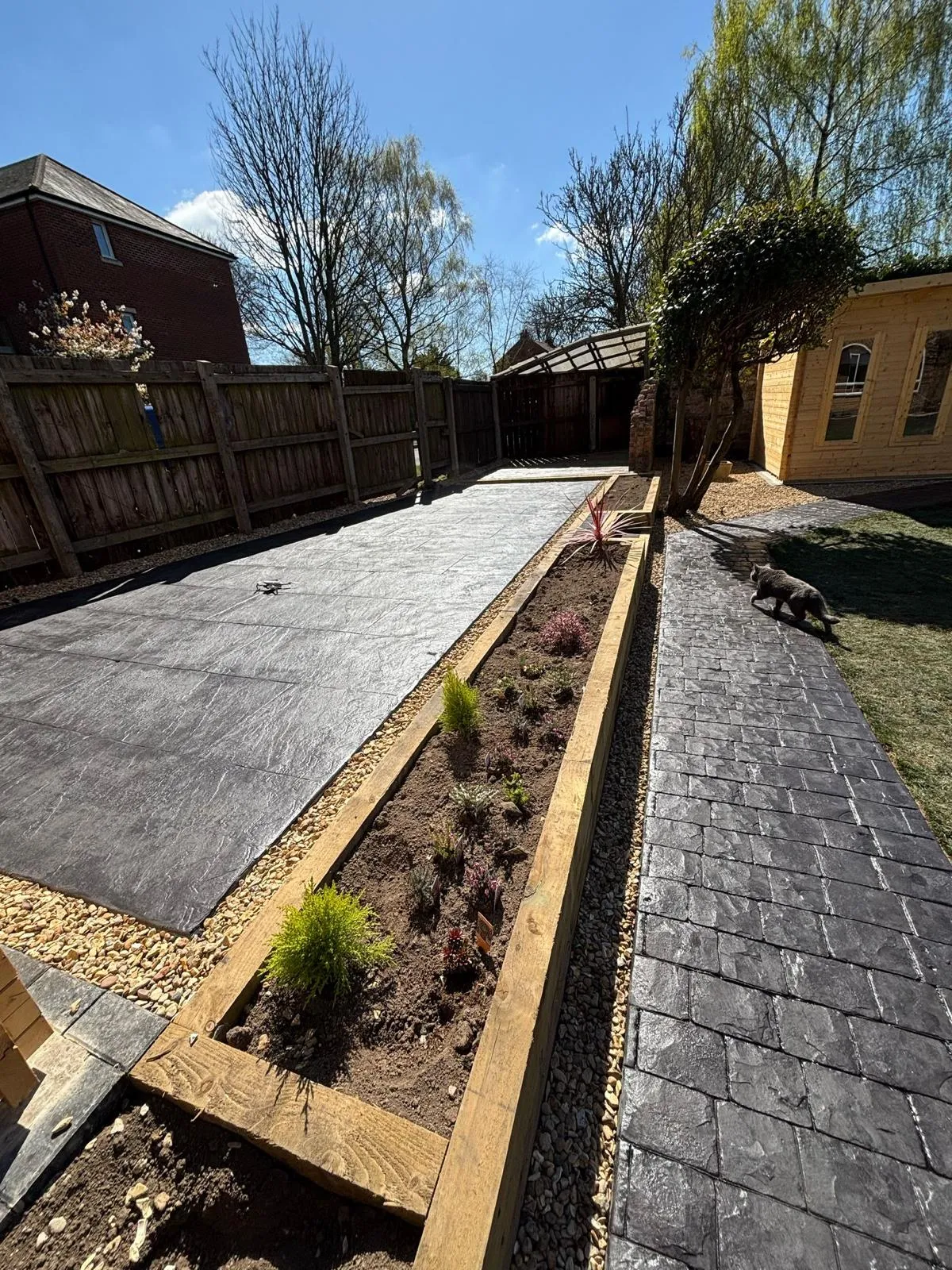 Pattern-imprinted concrete driveway in Spalding by Urban Planet Construction