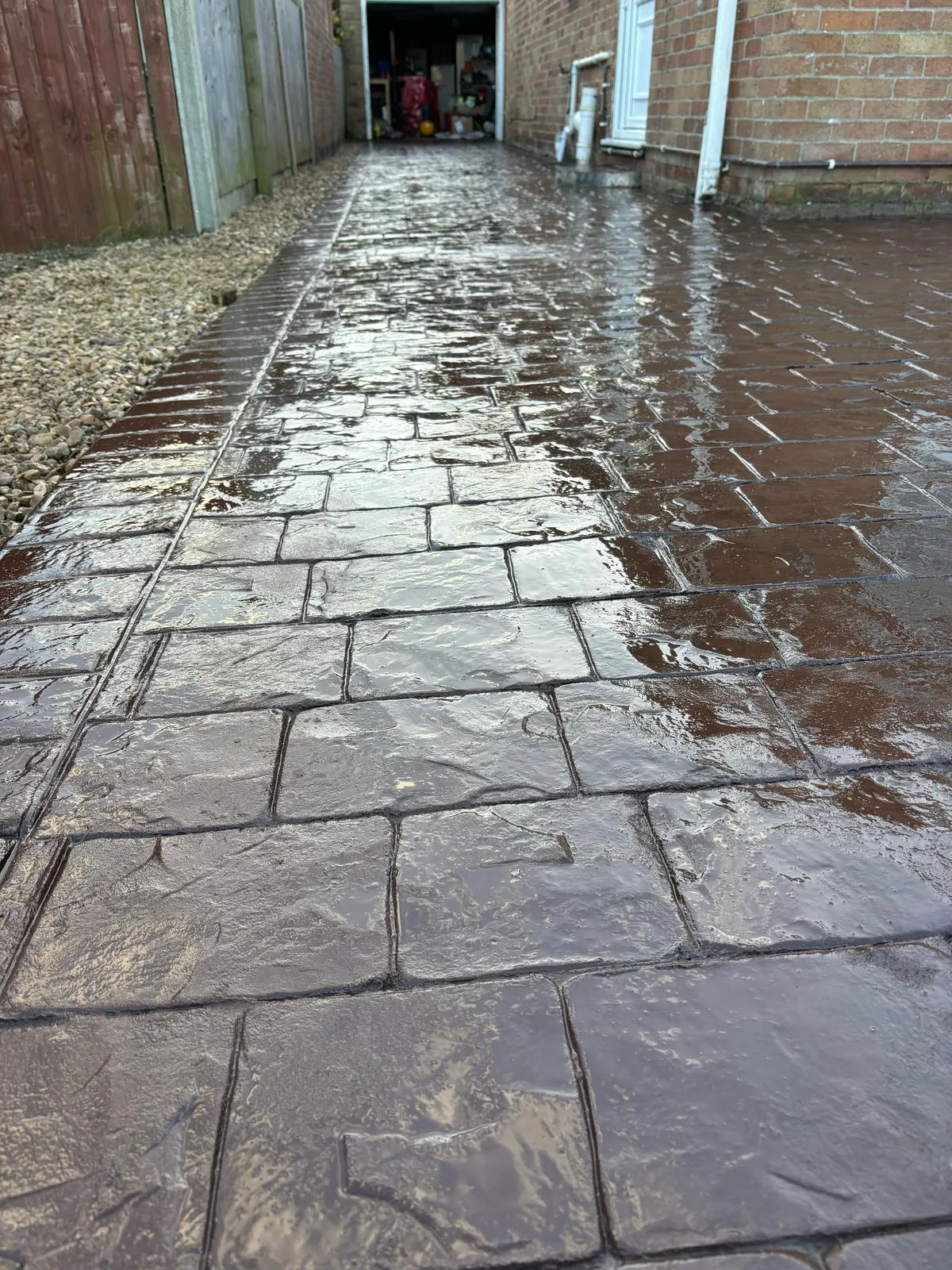 Pattern-imprinted concrete driveway in Chatteris by Urban Planet Construction