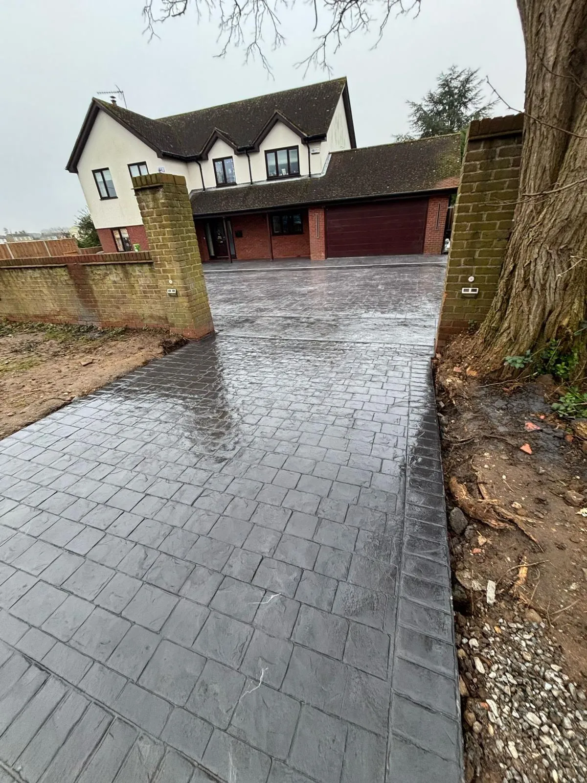 Pattern-imprinted concrete driveway in Huntingdon by Urban Planet Construction