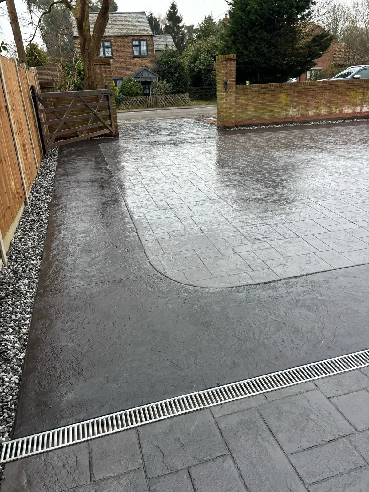 Pattern-imprinted concrete driveway in Thetford by Urban Planet Construction