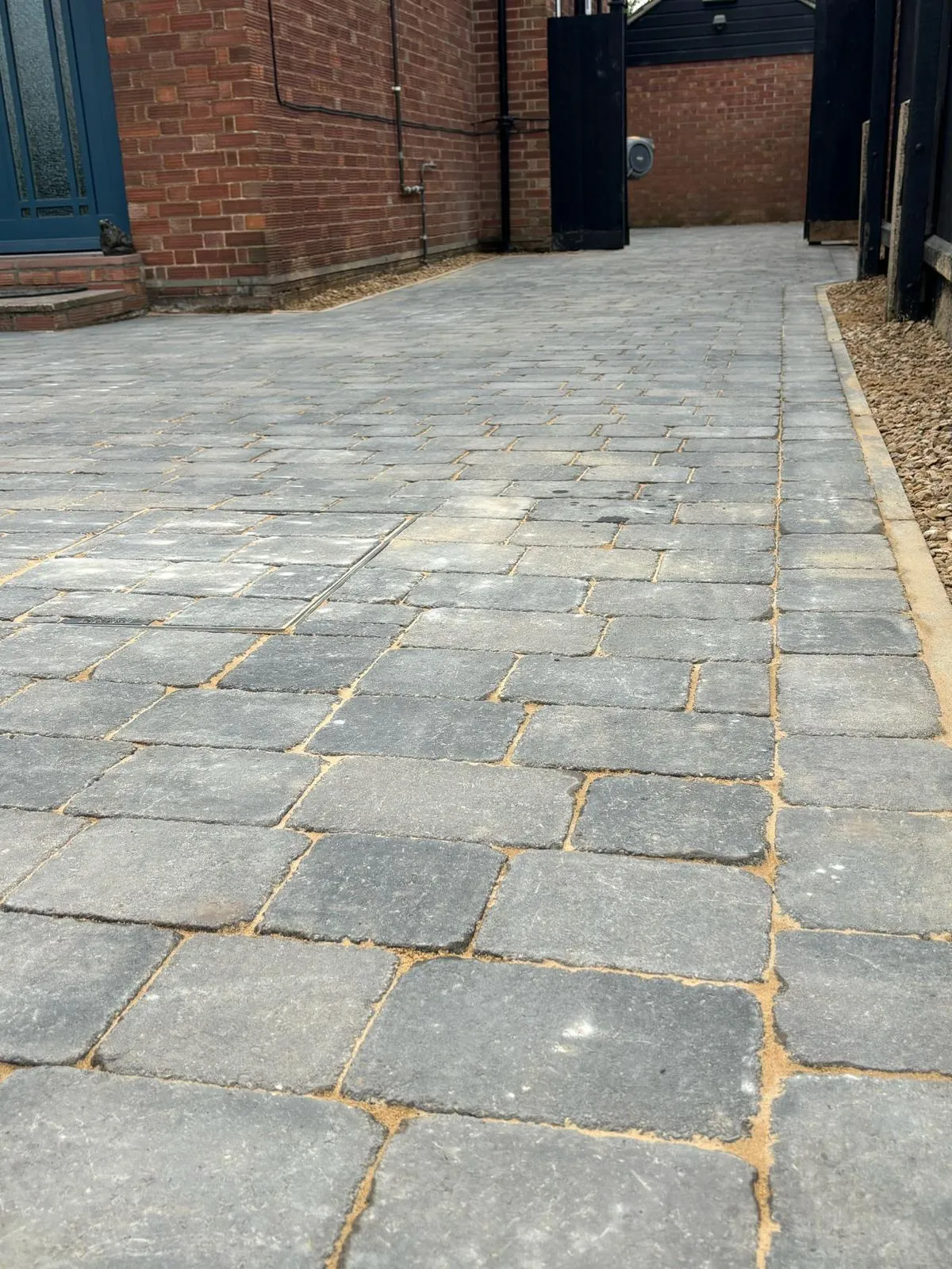 Pattern-imprinted concrete driveway in Littleport by Urban Planet Construction
