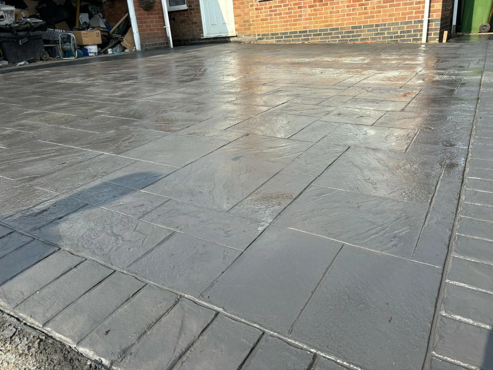 Pattern-imprinted concrete driveway in Dereham by Urban Planet Construction