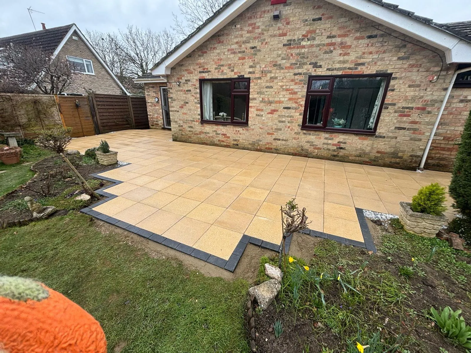 Indian sandstone patio by Urban Planet Construction