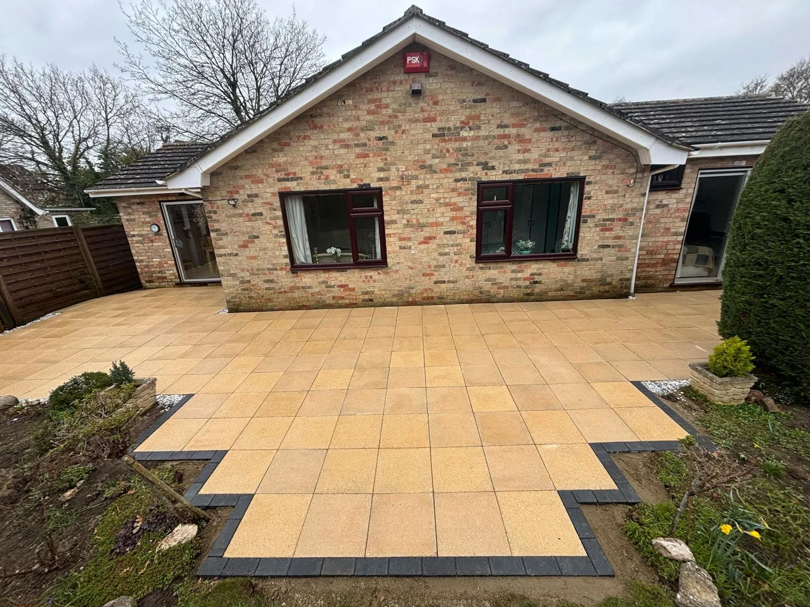 Indian sandstone patio by Urban Planet Construction
