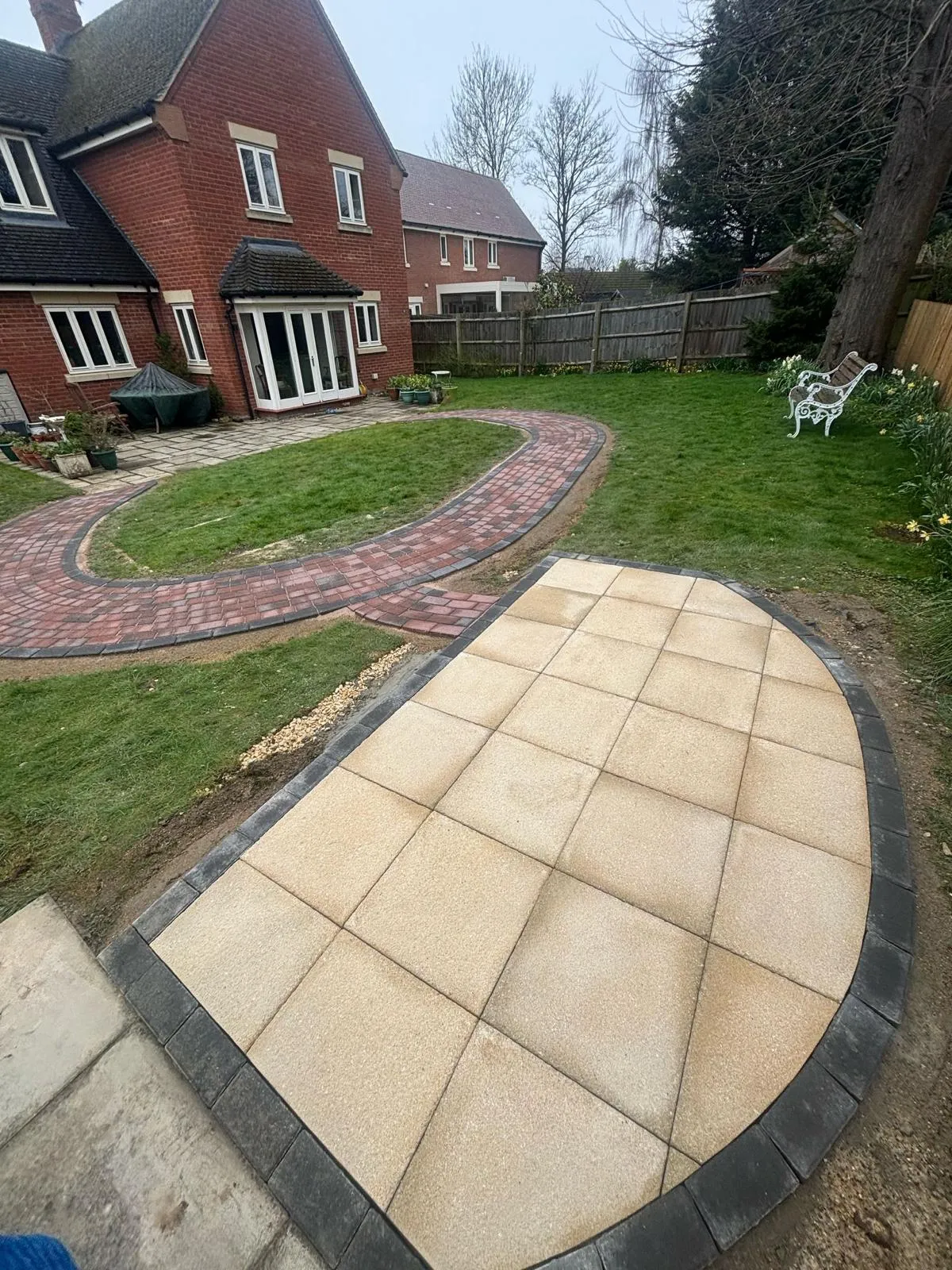Indian sandstone patio by Urban Planet Construction