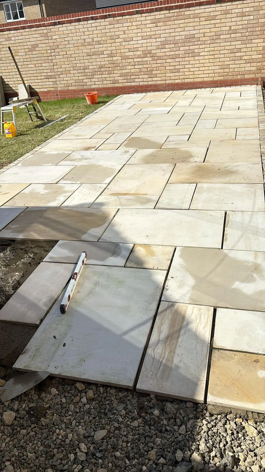 Indian sandstone patio by Urban Planet Construction