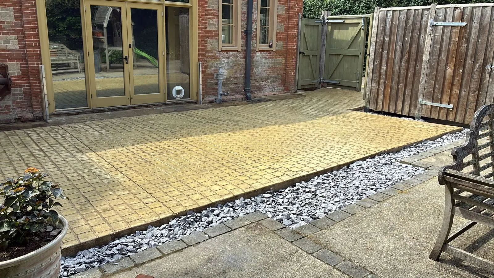 Indian sandstone patio by Urban Planet Construction