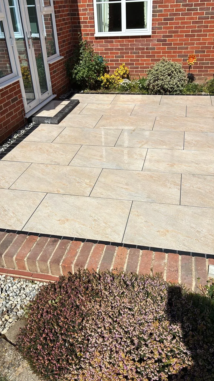 Indian sandstone patio by Urban Planet Construction